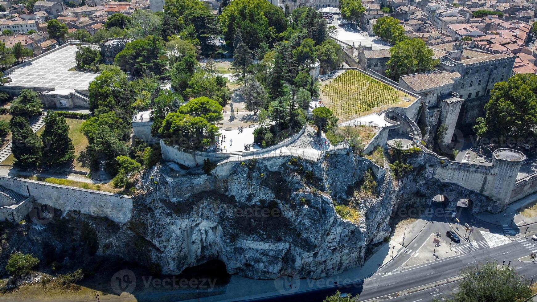 Belvdre Panoramique du Rhne panoramic terrace in Avignon, a natural rock face overlooking a beautiful view of the Rhne river and the city. Aerial view of a public park and the city of Avignon. photo
