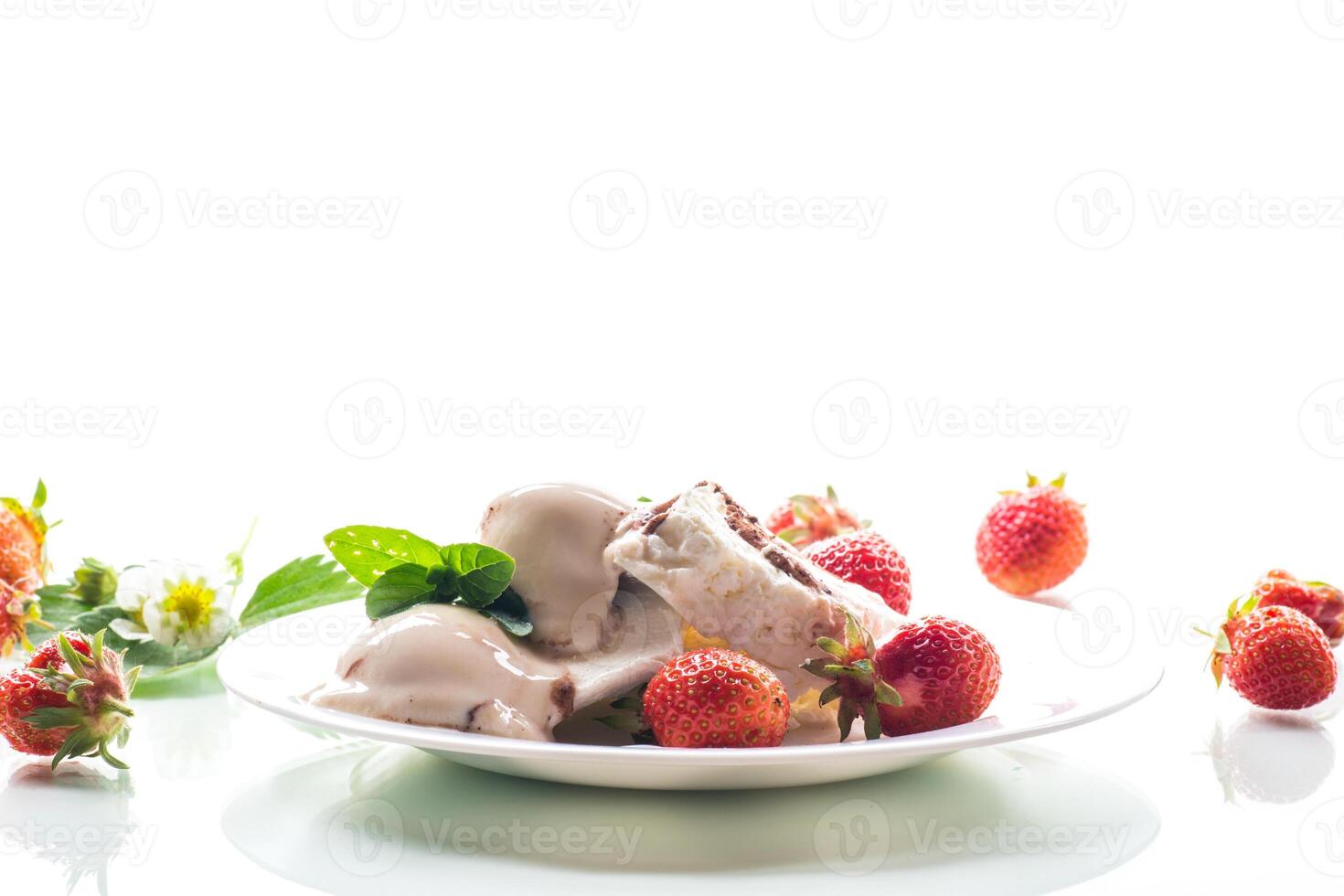 fresh organic cottage cheese with strawberries and ice cream in a plate photo