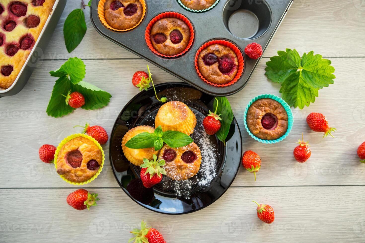 Sweet curd muffins with strawberry filling photo