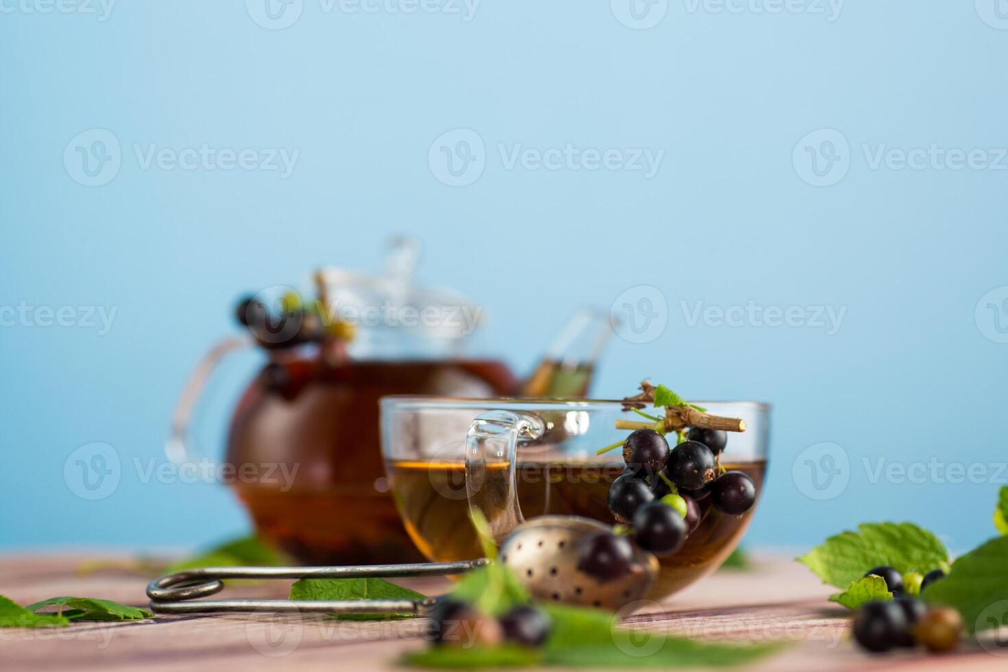 herbal tea from currant leaves and berries photo