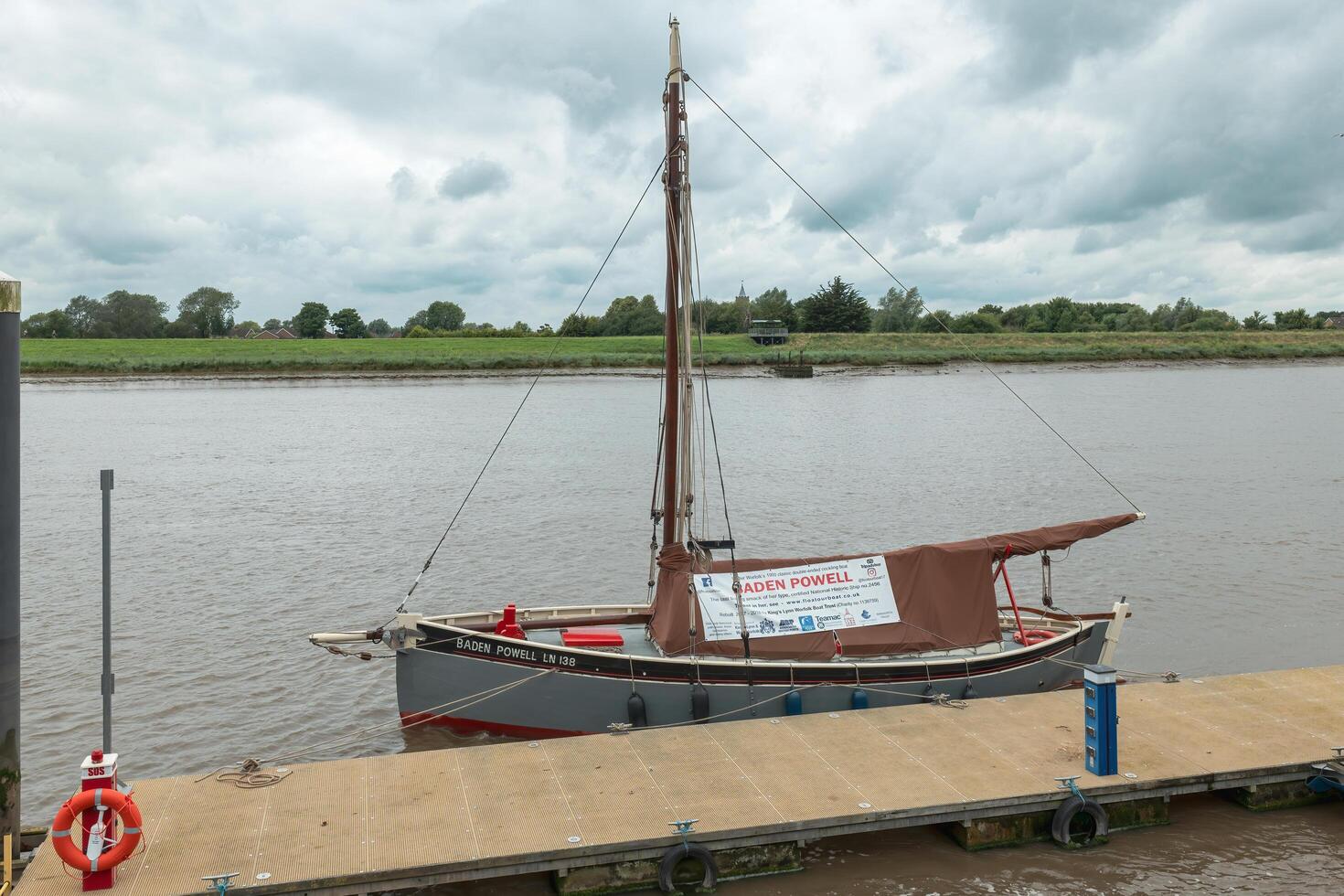 KINGS LYNN, NORFOLK, UK, JULY 9. View of the Baden Powell sailing smack moored on the River Great Ouse in Kings Lynn, Norfolk, UK on July 09, 2024 photo