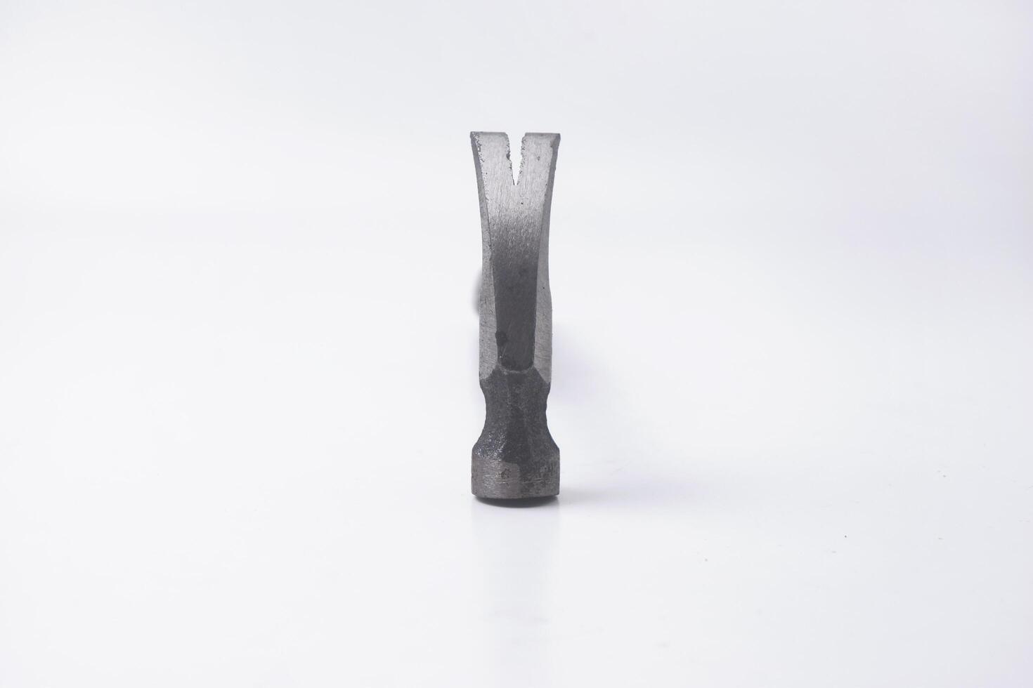 Close Up Photo of a hammer seen from above is on an isolated white background