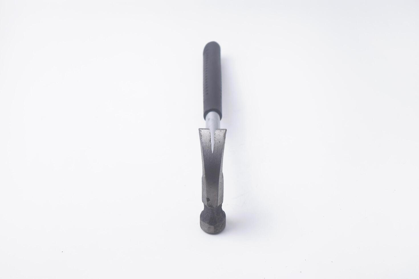 Close Up Photo of a hammer seen from above is on an isolated white background