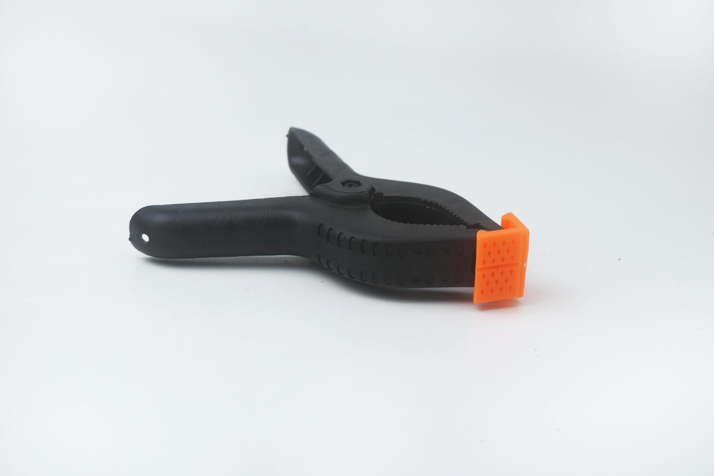 Photo of a clamp clamping on a white background