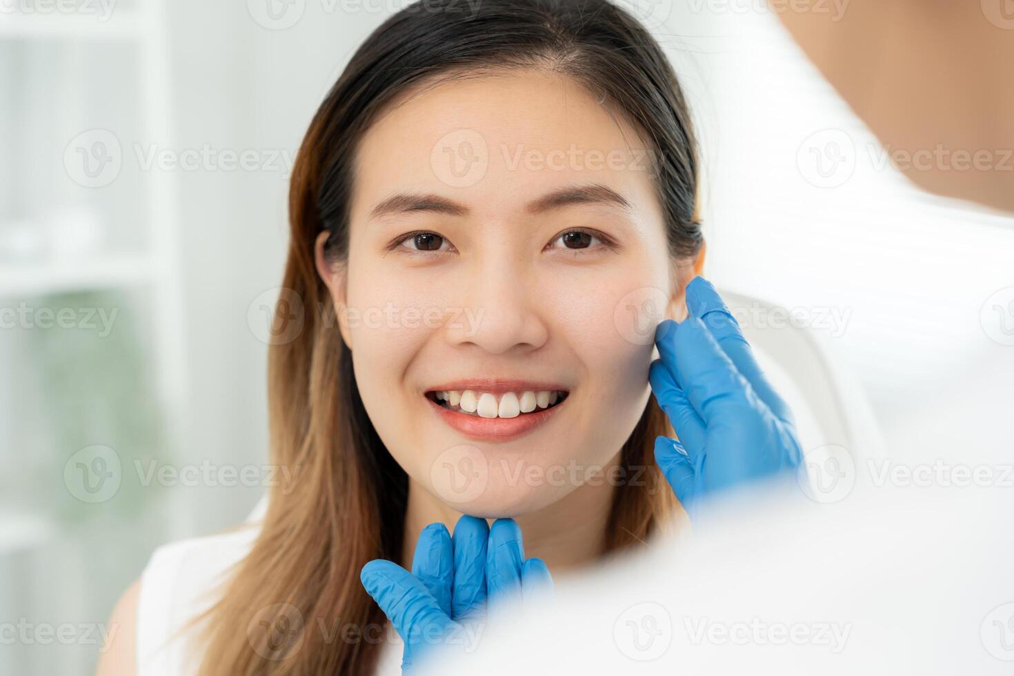 plastic surgery, beauty, Surgeon or beautician touching woman face, surgical procedure that involve altering shape of face, doctor examines patient face, medical assistance, health photo