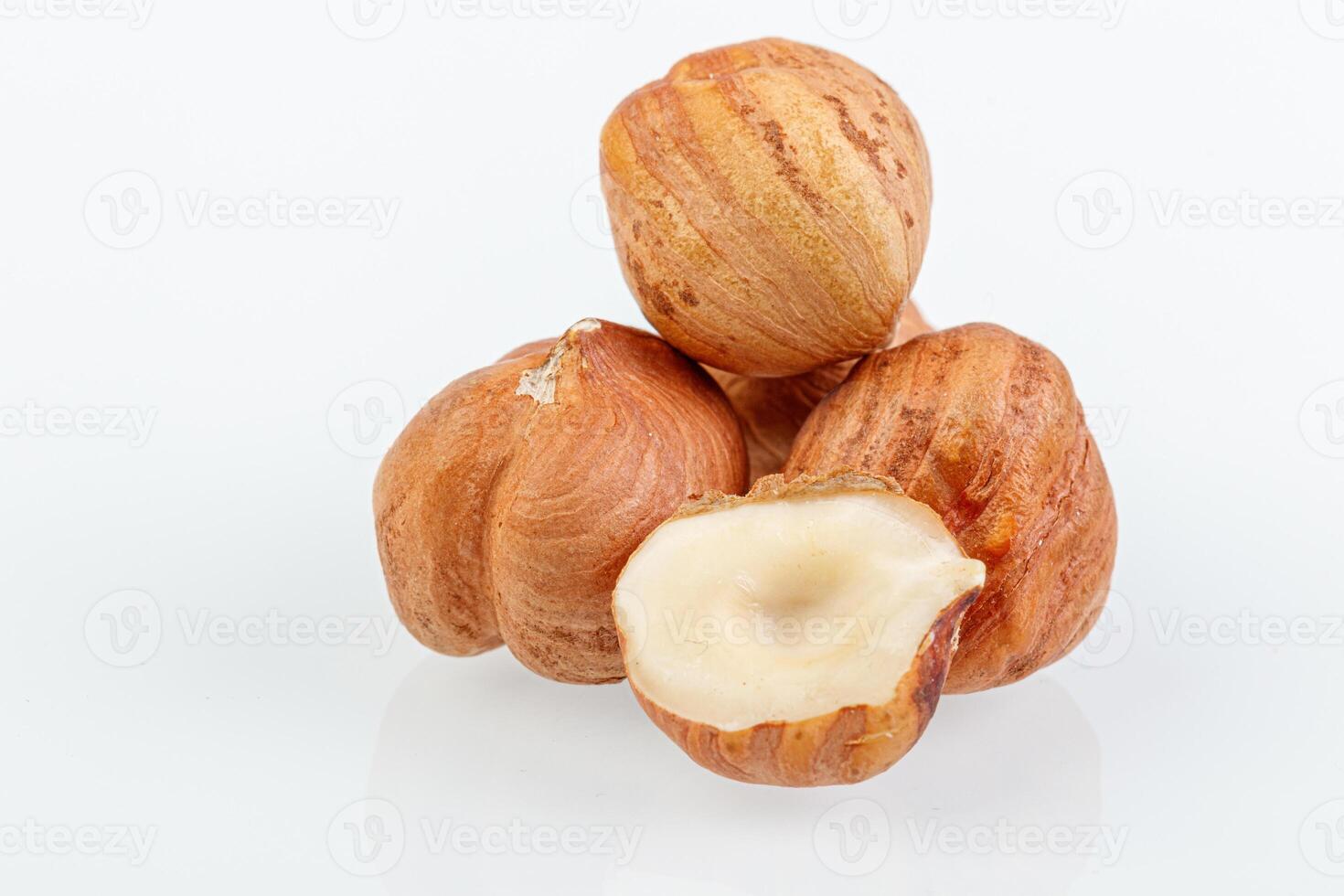 macro hazelnuts nuts on a white background photo