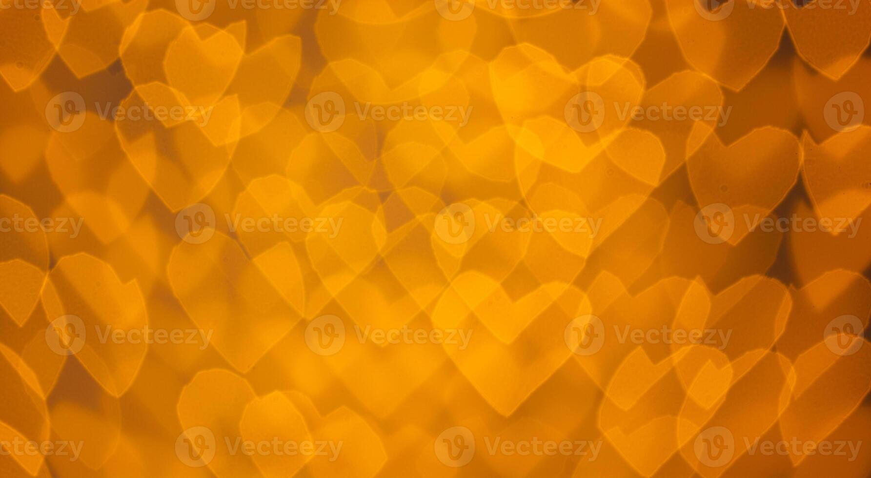 beautiful hearts made of lights on a blurred background photo