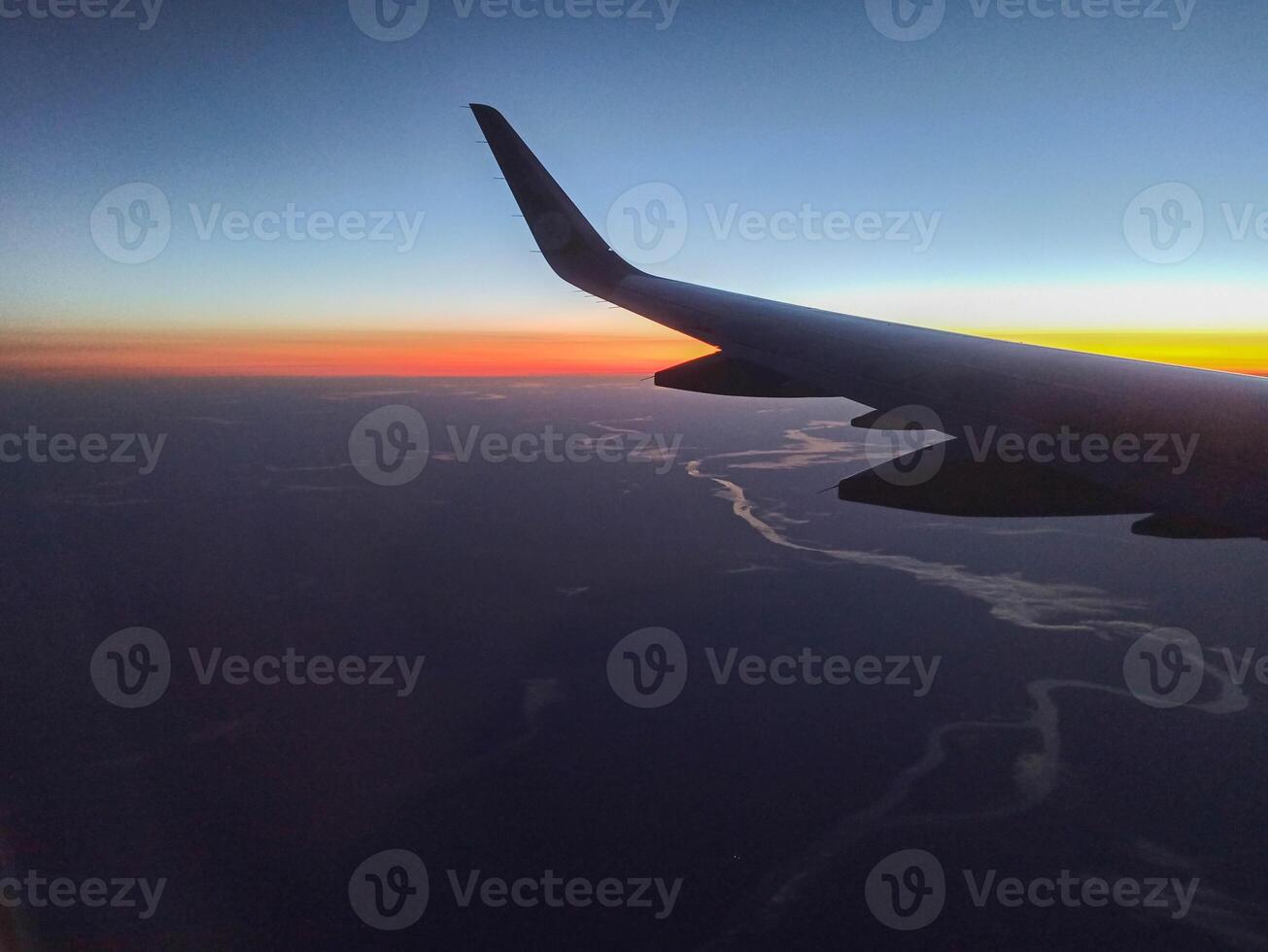 A snapshot of the city at night from the height of the plane's flight photo