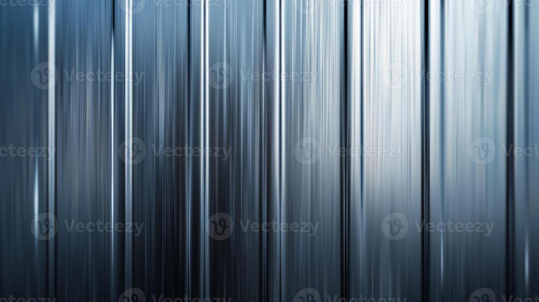 Smooth metal background with a gradient effect and subtle shine silver to dark gray tones photo