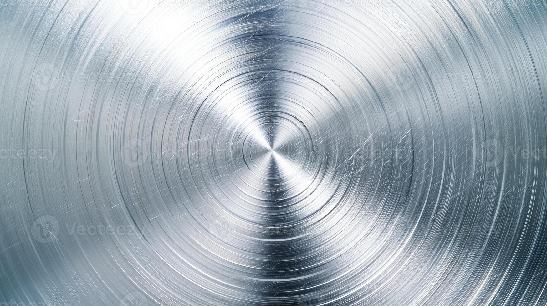 Metal background with a brushed circular pattern polished and shiny finish silver and light gray tones photo