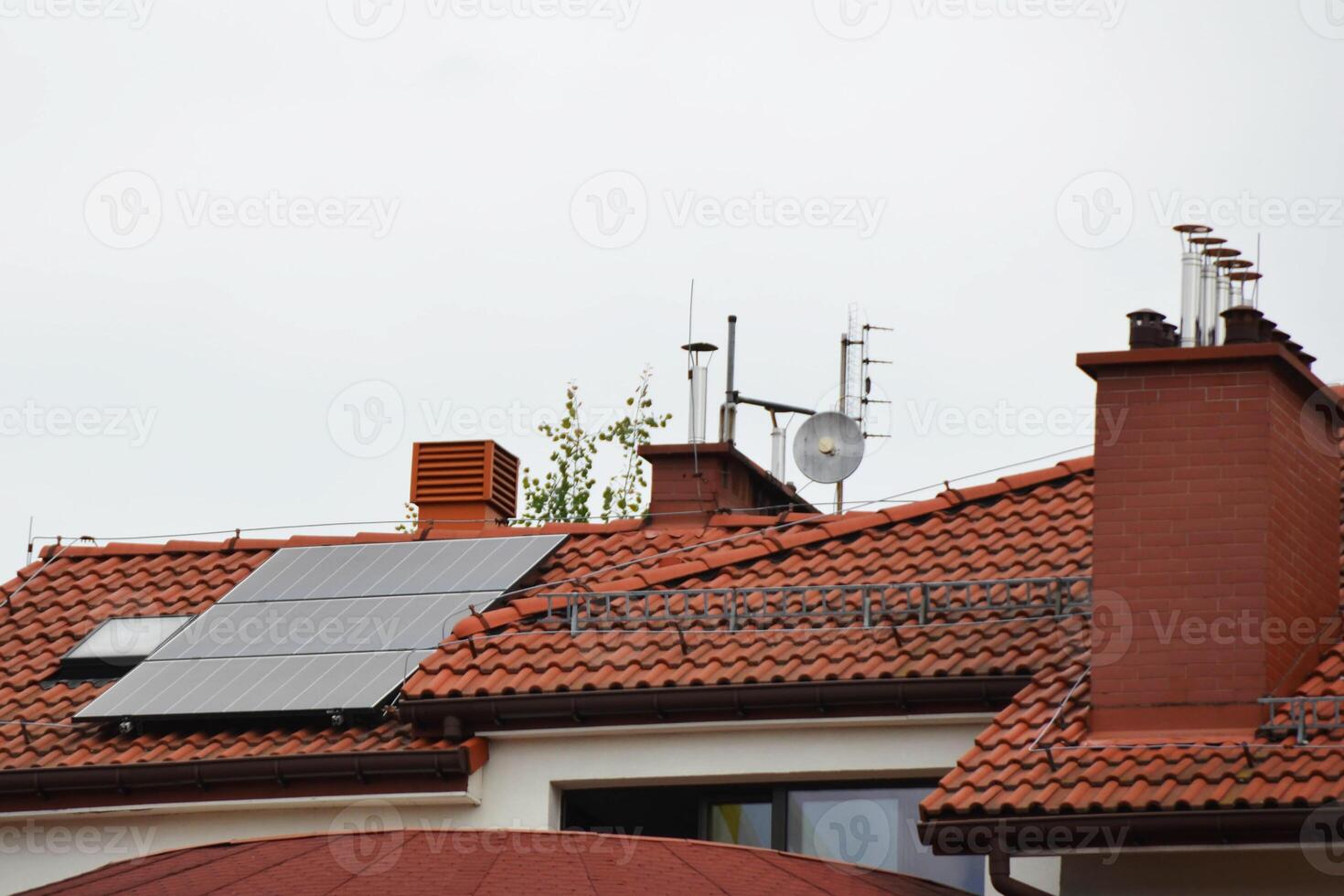 Installing a Solar Cell on a Roof. photo