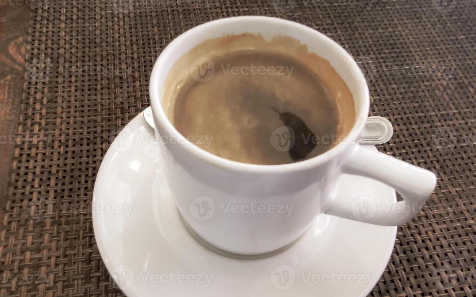 Cup of americano black coffee in restaurant cafe in Mexico. photo
