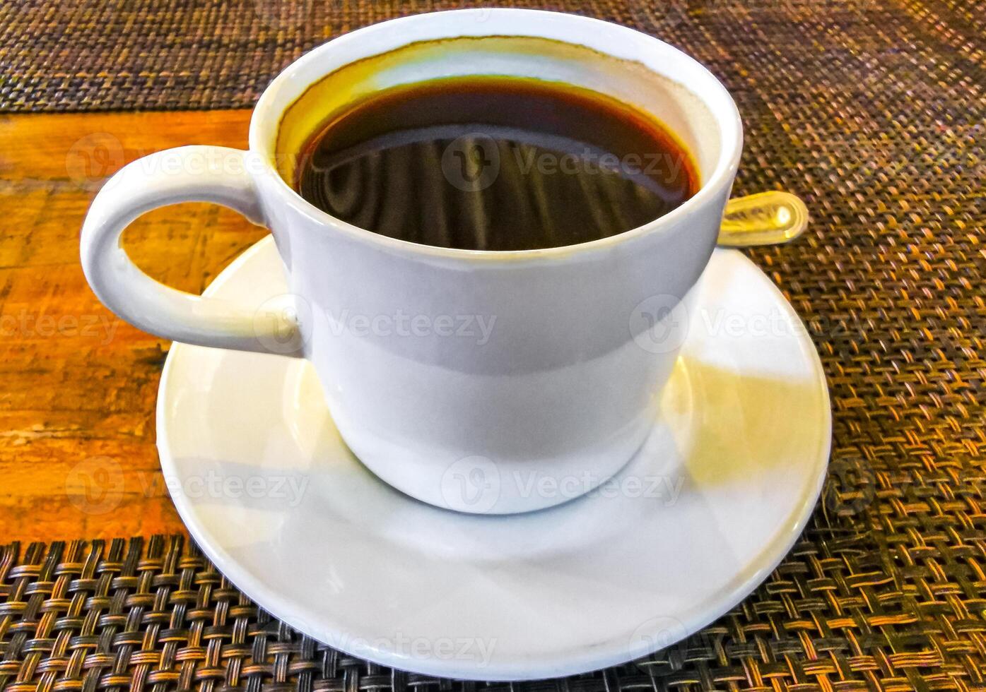 Cup of americano black coffee in restaurant cafe in Mexico. photo