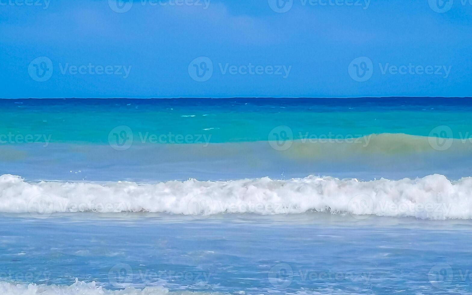 Tropical Caribbean beach clear water waves Playa del Carmen Mexico. photo