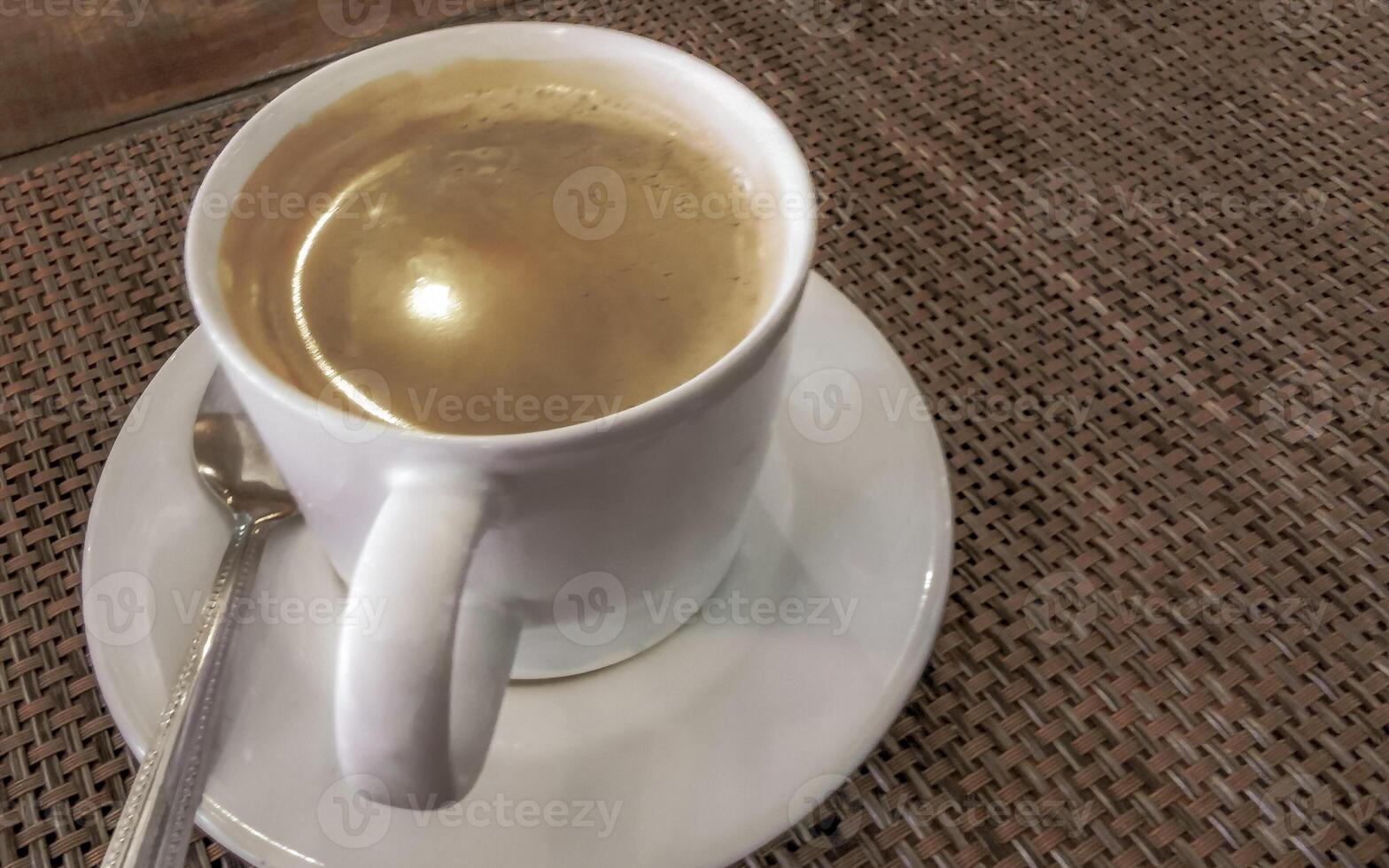 Cup of americano black coffee in restaurant cafe in Mexico. photo