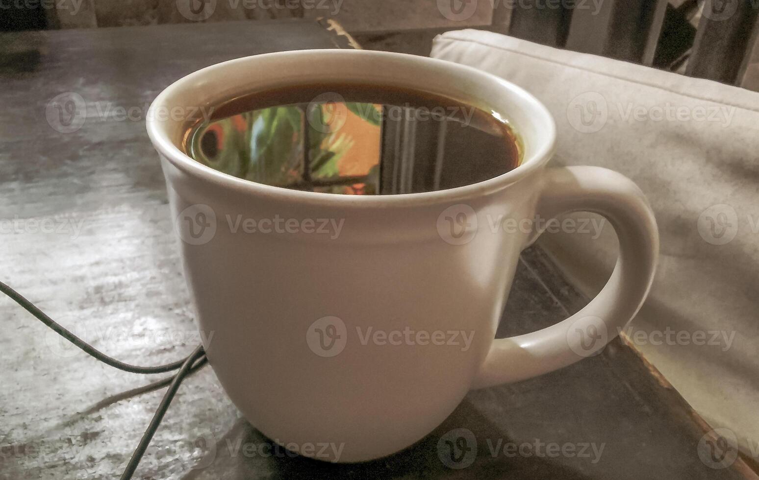 Cup of americano black coffee in restaurant cafe in Mexico. photo