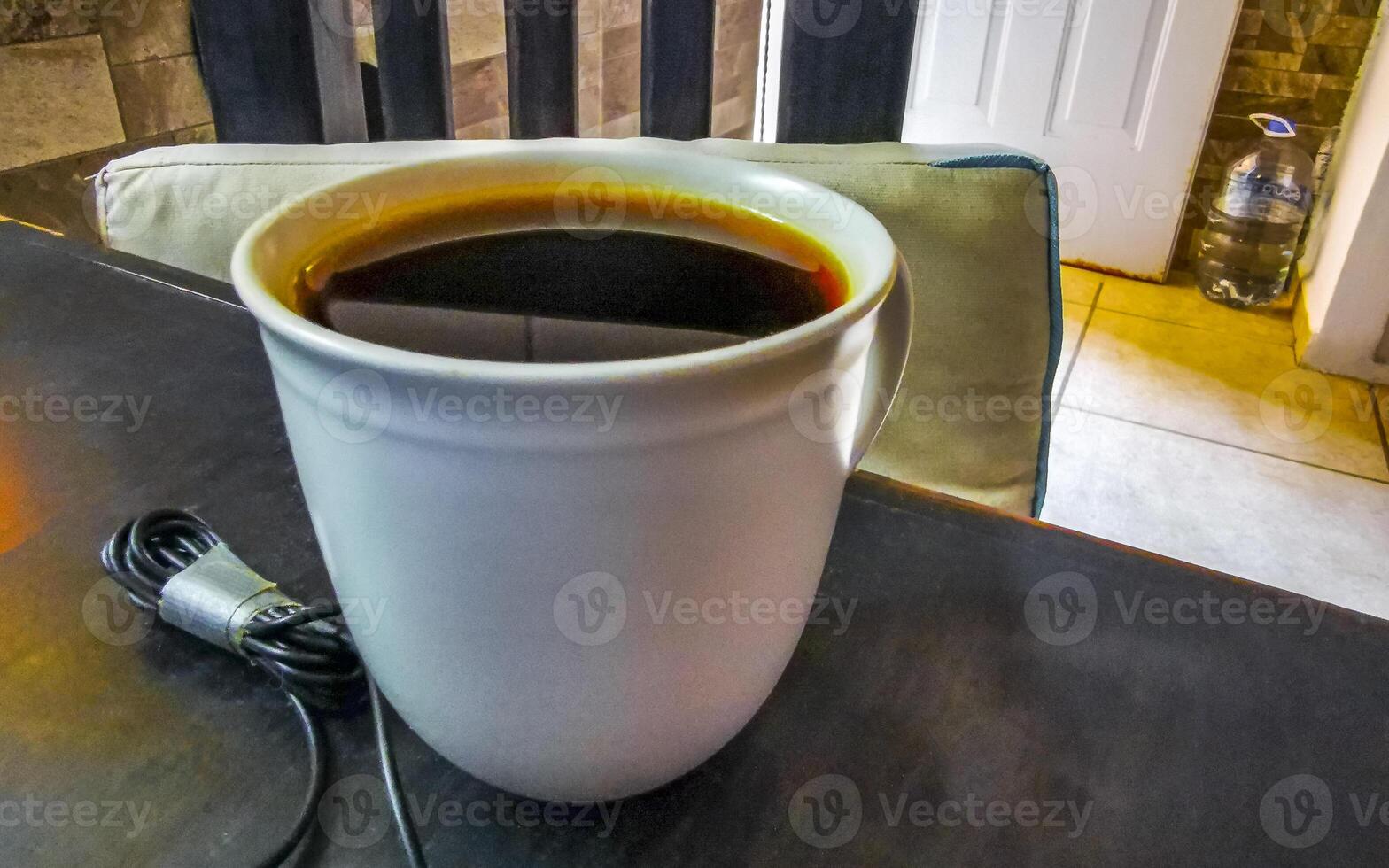 Cup of americano black coffee in restaurant cafe in Mexico. photo