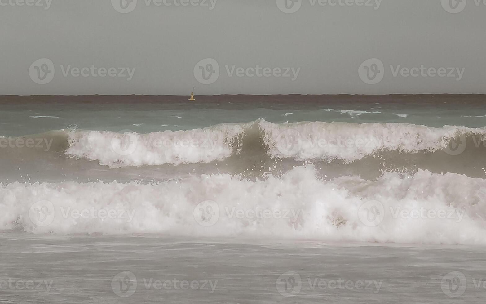 Tropical Caribbean beach clear water waves Playa del Carmen Mexico. photo