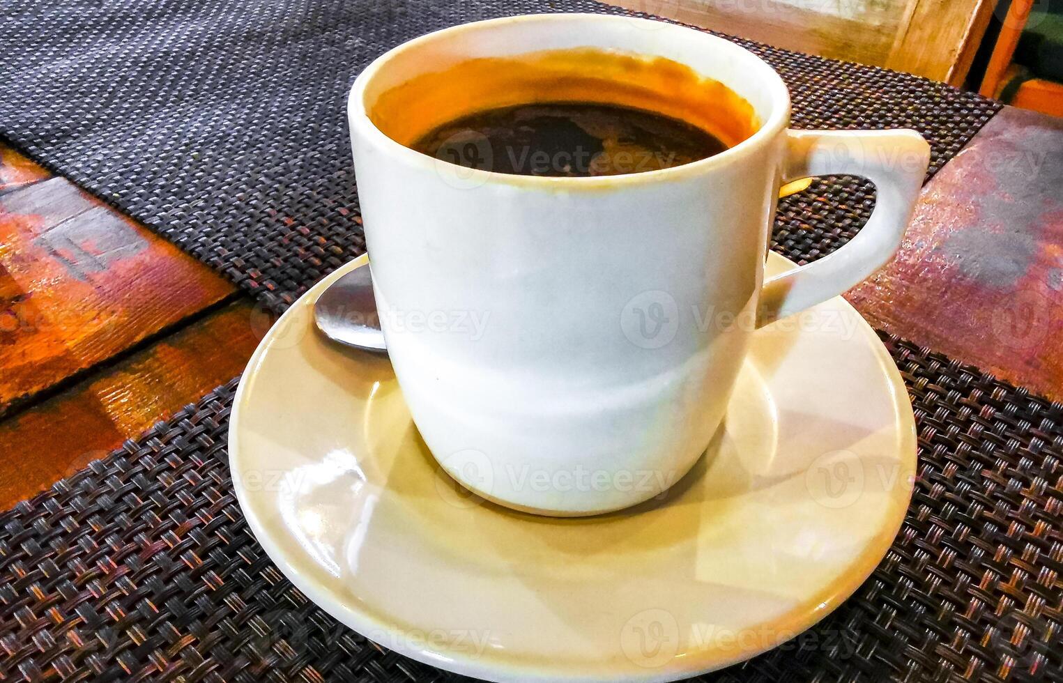 Cup of americano black coffee in restaurant cafe in Mexico. photo