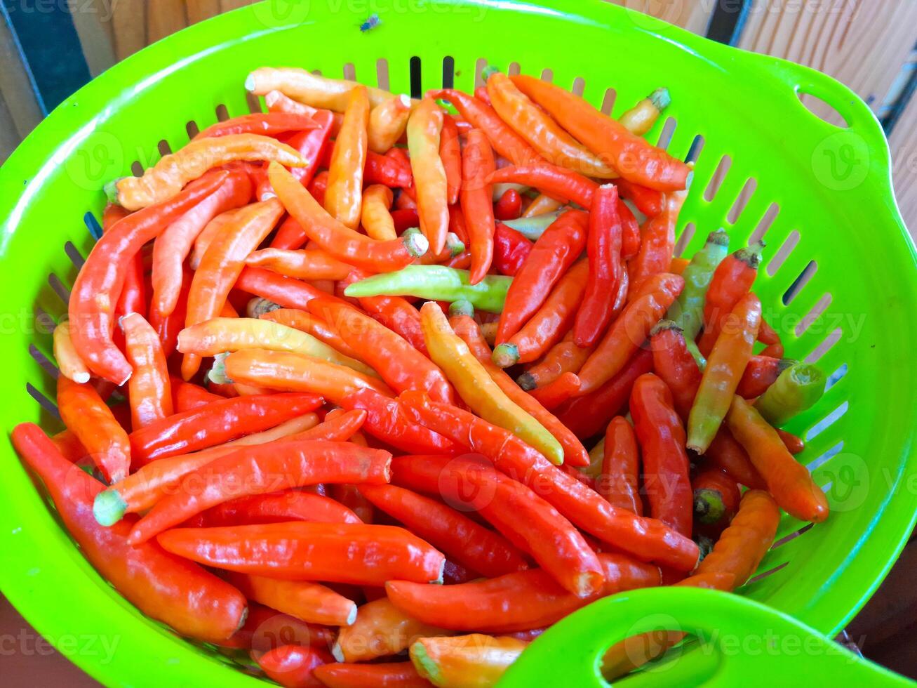 photo of red cayenne pepper in a basket