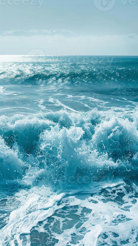 Ocean waves crashing and churning, creating a white foamy surface photo
