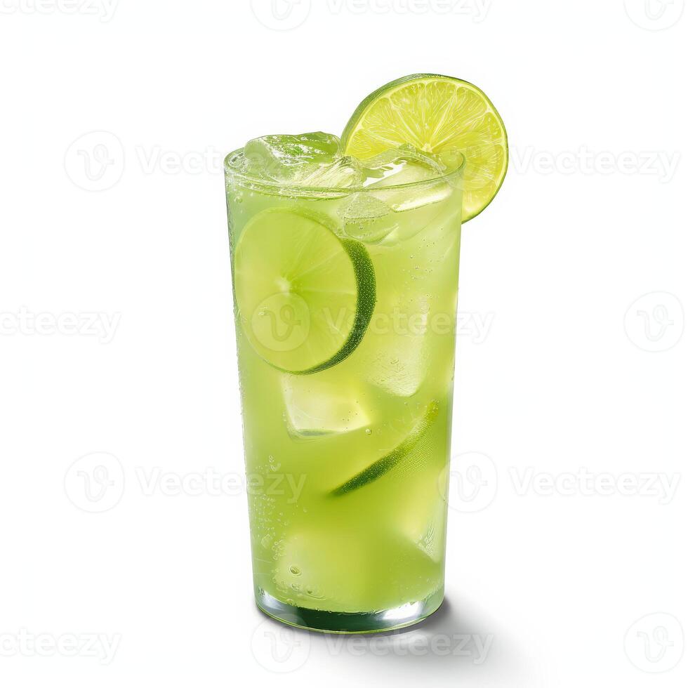 A tall glass of limeade with ice cubes and lime slices photo