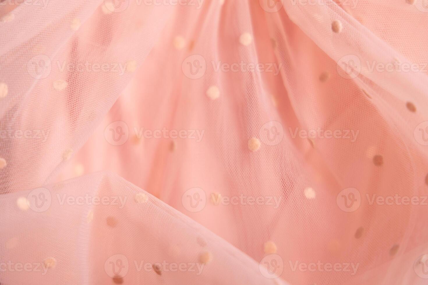 Tulle fabric texture background, textile pattern, pink polka dot on tulle, copy space photo