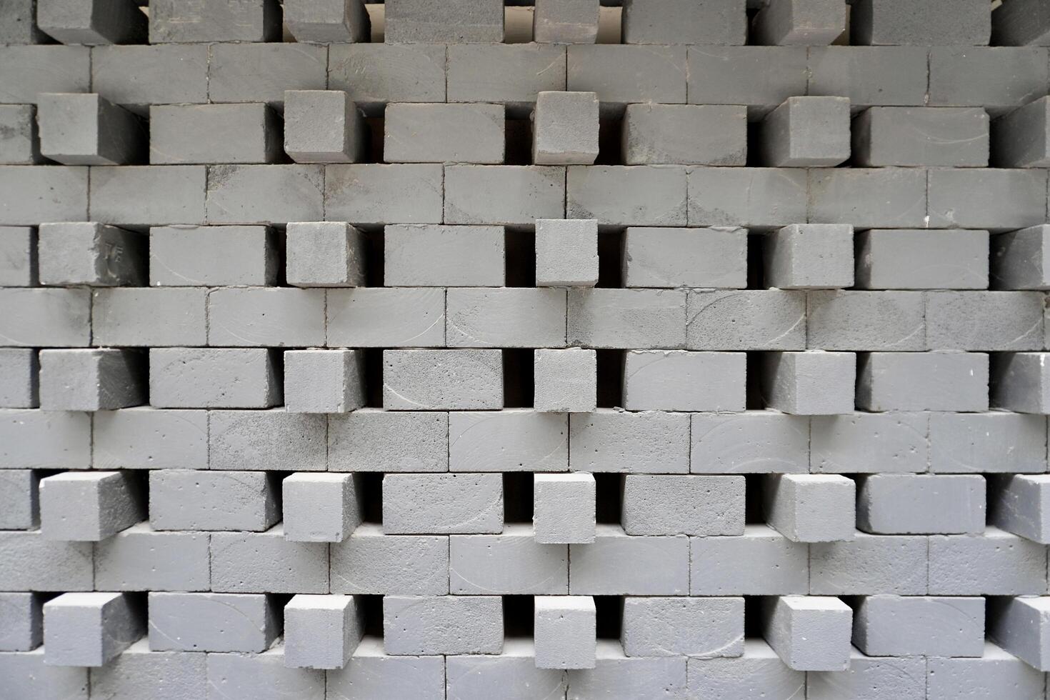 Decorative gray brick stone window ventilation exterior design isolated on horizontal building wall background. photo