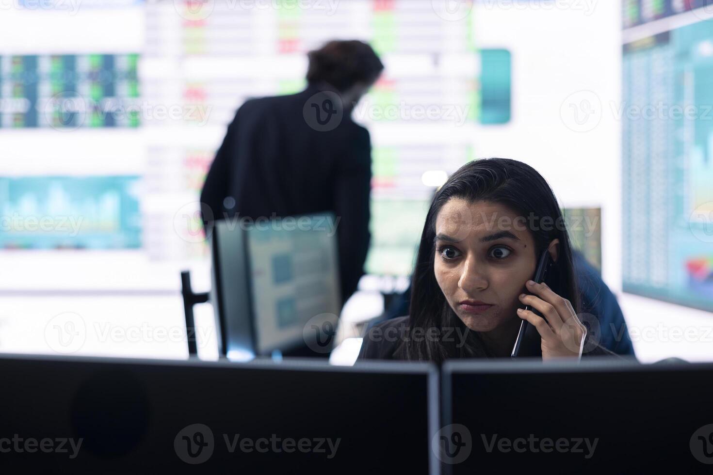 Business associate presents daily tasks order to enterprise administrator, discussing on phone call about funding and resources allocation in order to expand globally. Teamwork. photo