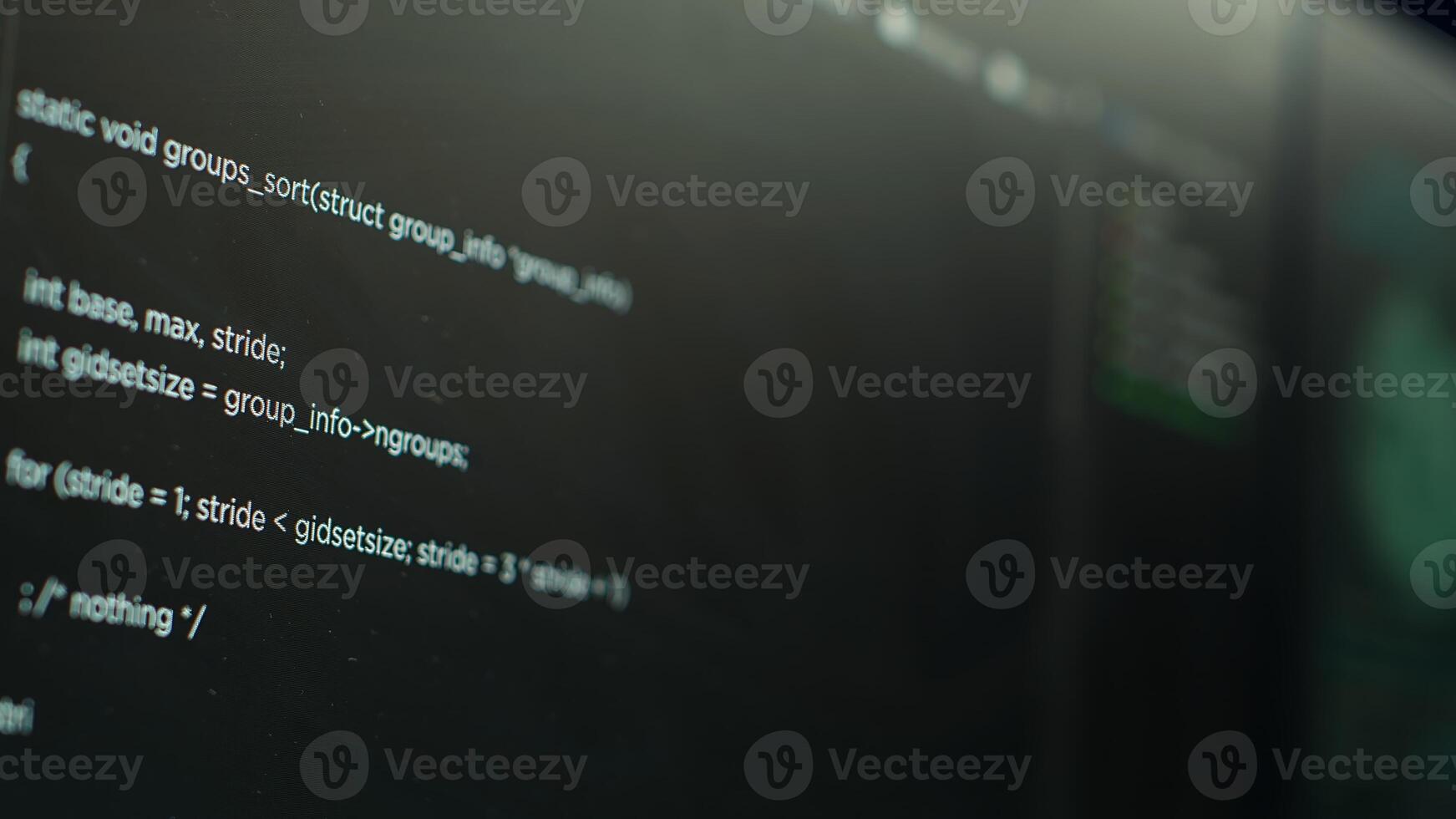 Extreme close up shot of lines of code displayed on computer monitors used by cybercriminal stealing sensitive information. Virus scripts running on PC infecting network systems, breaking passwords photo