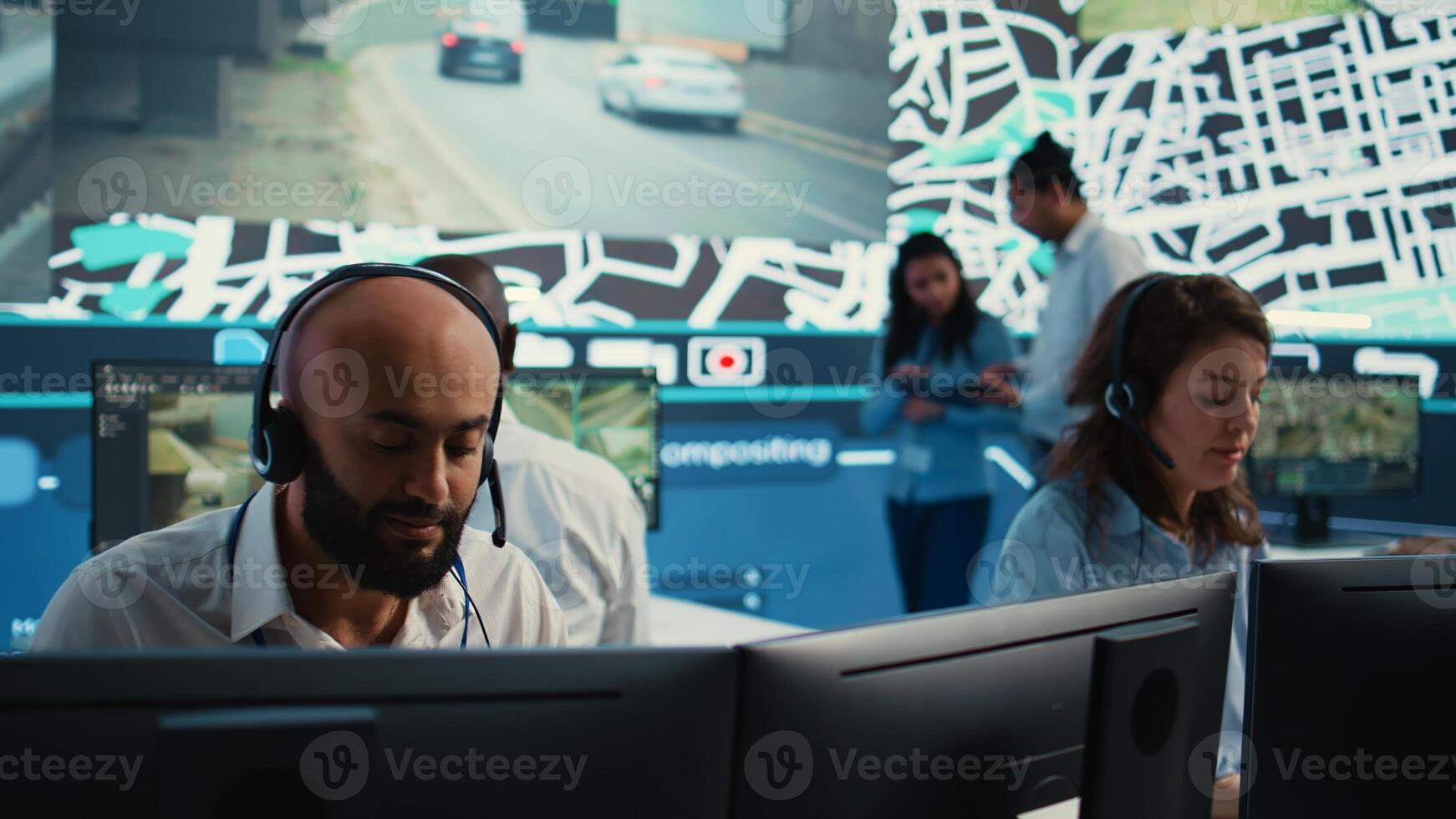 Woman call center operator transmitting directions through traffic after monitoring surveillance radar system at stop lights. Employee working on order tracking and express delivery. Camera B. photo