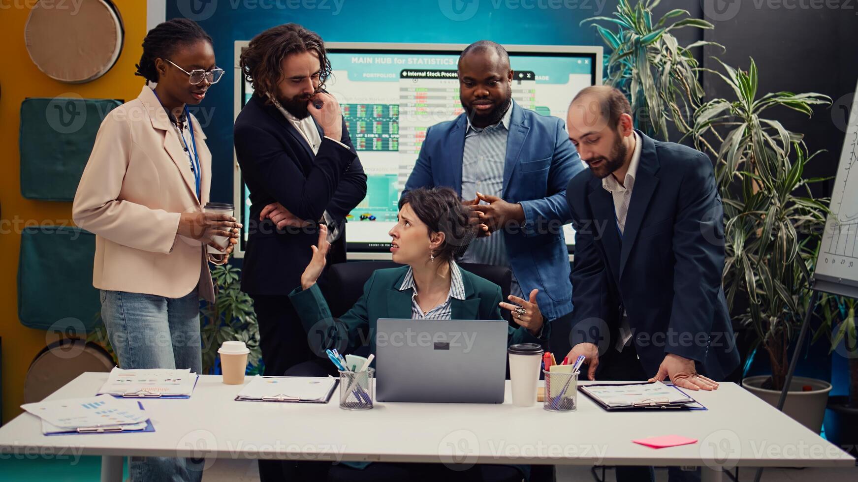 Employees team showing their project updates to the supervisor, crazy manager yelling at her staff members and being displeased with their progress. Disappointed leader judging associates. Camera B. photo