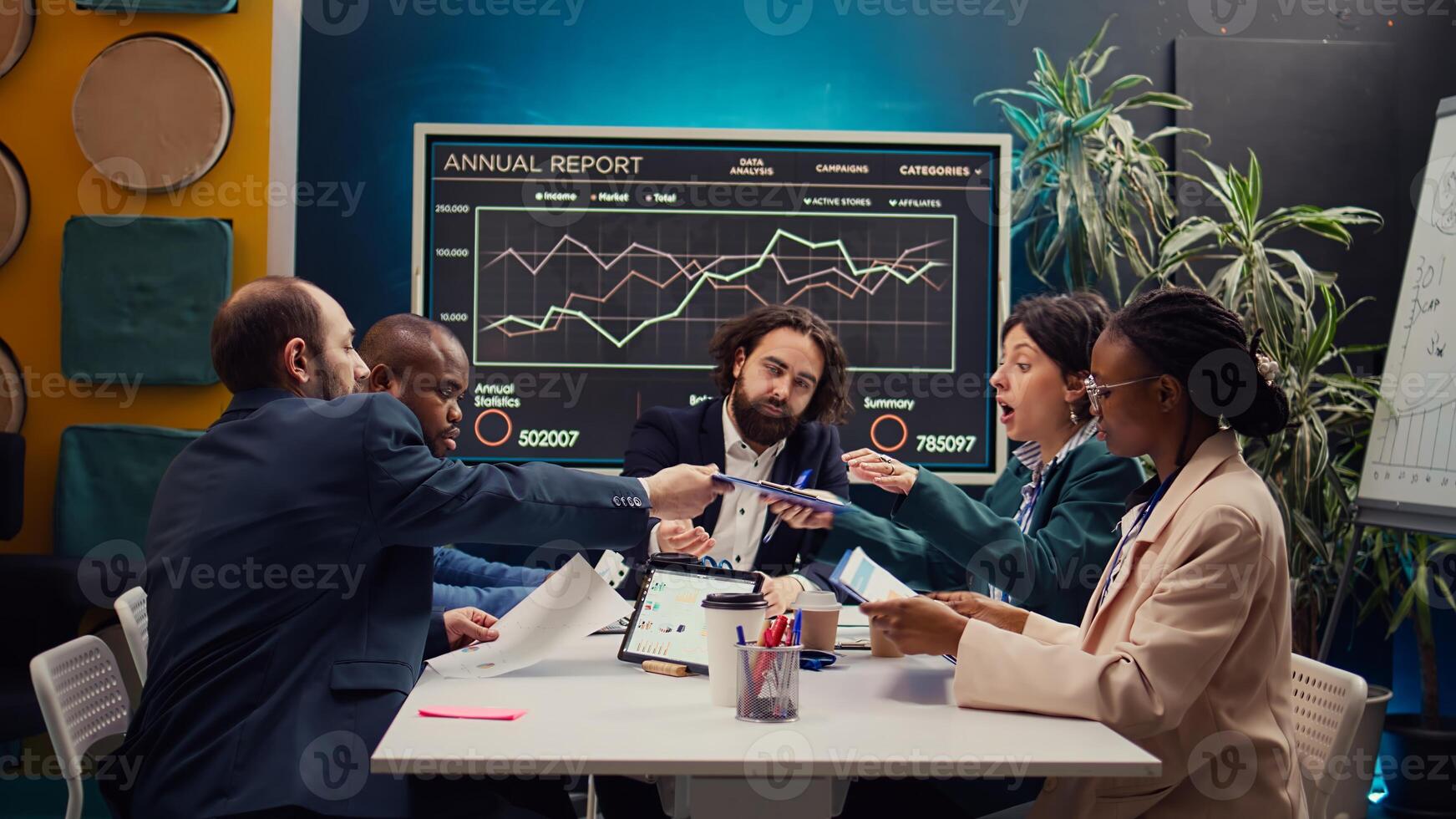 Forecast affiliates gathering infographics data in developing meeting, address brand differentiation strategies to highlight company unique value in the market. Public relations management. Camera B. photo