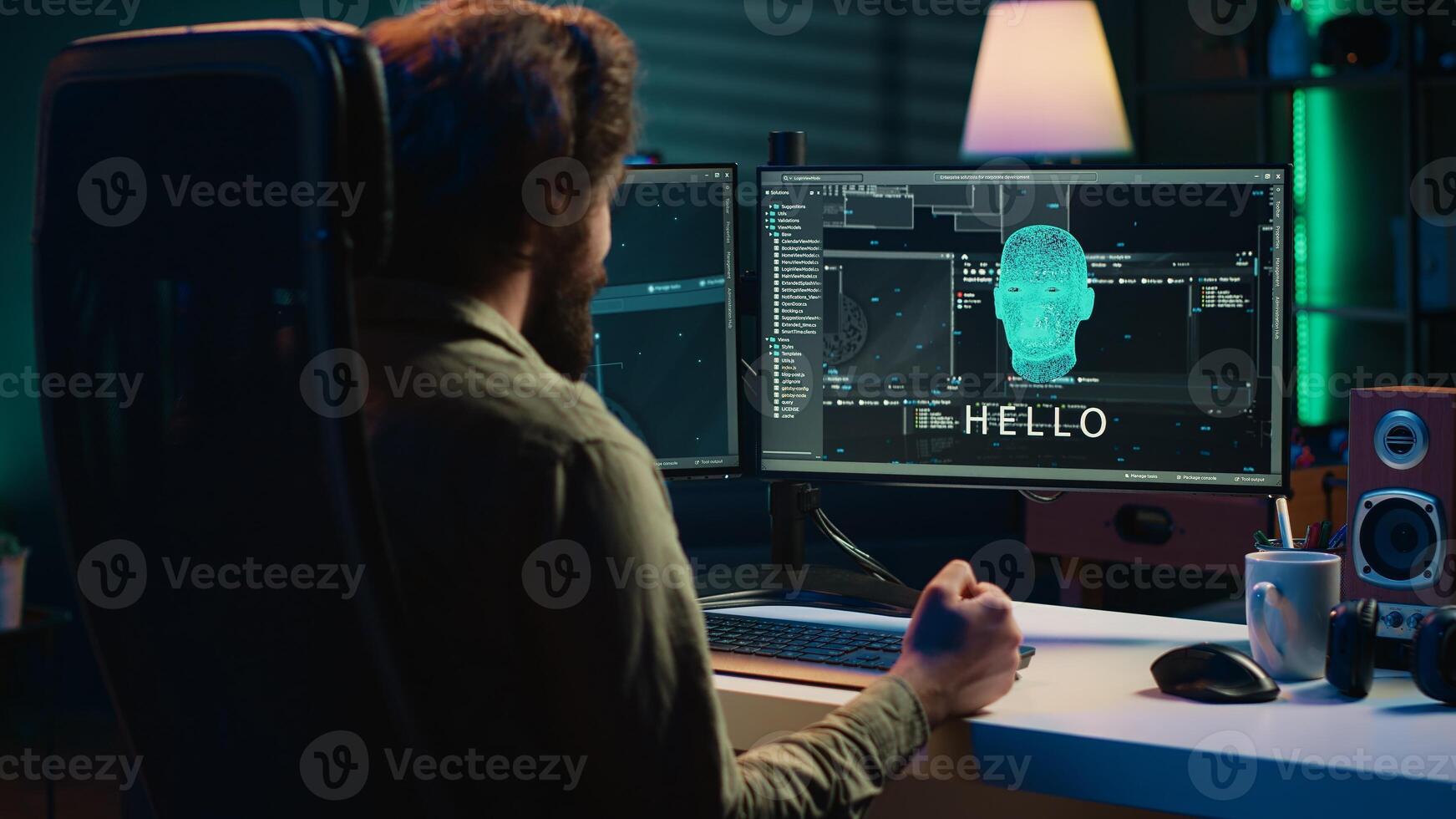 Programmer being asked existential questions by awaken AI gaining consciousness, emulating humans, becoming self aware. Developer speaking with artificial intelligence on PC, camera A photo
