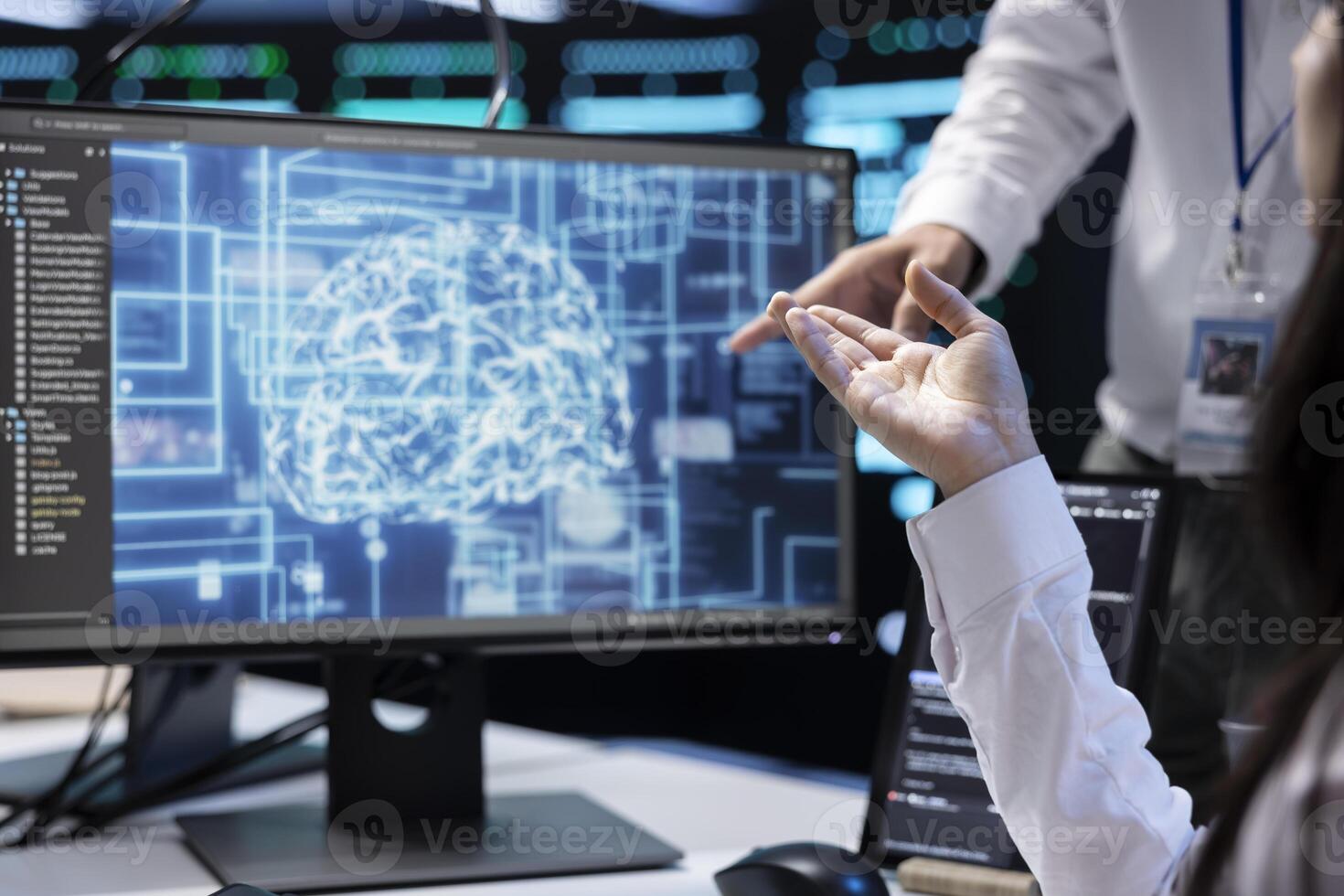 Technicians working in data center with artificial intelligence technology to process massive datasets, close up. IT specialists in server hub facility storing data used for machine learning photo