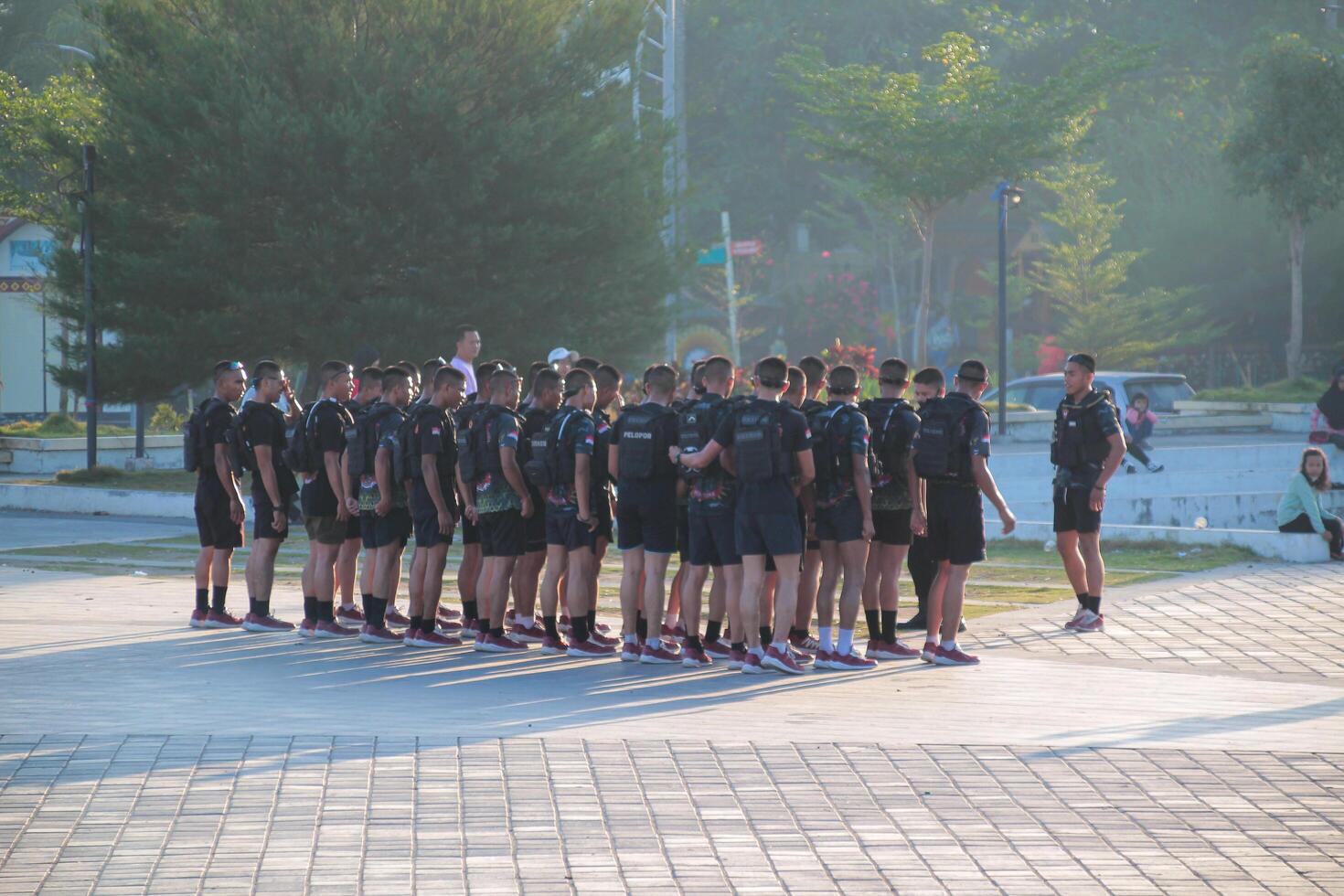 Lombok, March 2 2024, Indonesia - a group of young Indonesian soldiers are training in Loang Balok park in the morning photo