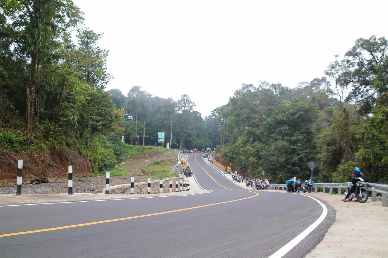 Highway atmosphere in Pusuk Forest on March 9, 2024 - Sembalun, East Lombok, Indonesia photo