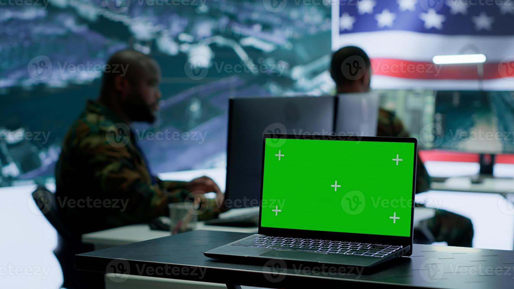 American army working in a command post with green screen, soldiers examining satellite imagery for clues regarding a national safety operation. US military control tower for surveillance. Camera A. photo