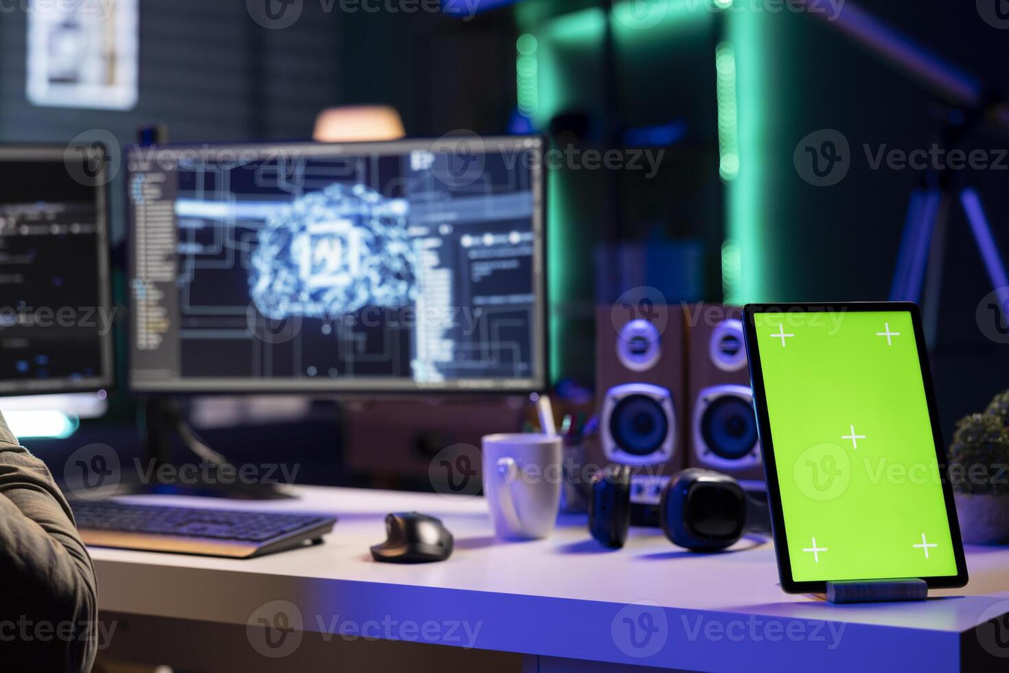 IT specialist scripting artificial intelligence on computer with isolated screen phone on desk next to it. Developer working on coding AI on desktop PC with mockup smartphone near photo