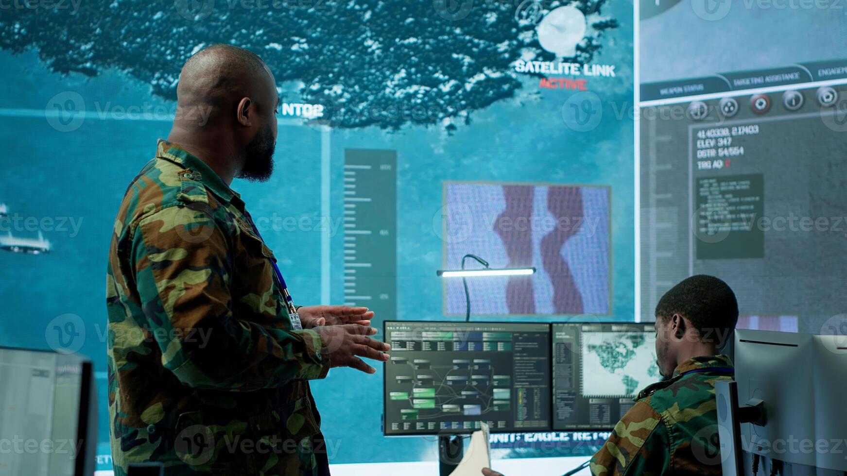 Military team operating in a high tech command post control tower, focusing on surveillance tactics for intelligence gathering. Data protection to manage critical information operations. Camera A. photo