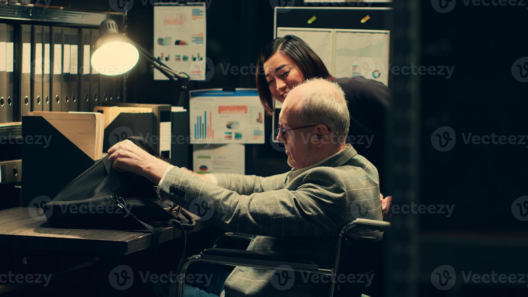Senior investigator with chronic disability works on legal case, developing customized assistive tools for archive room tasks. Detective analyzing forensic evidence for details. Camera A. photo