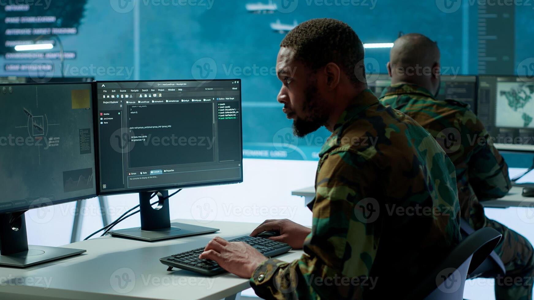 IT expert monitors AI brain intelligence system to collect crucial real time data for a new defense military operation on pc in command post. Security protocols for an intense mission. Camera A. photo