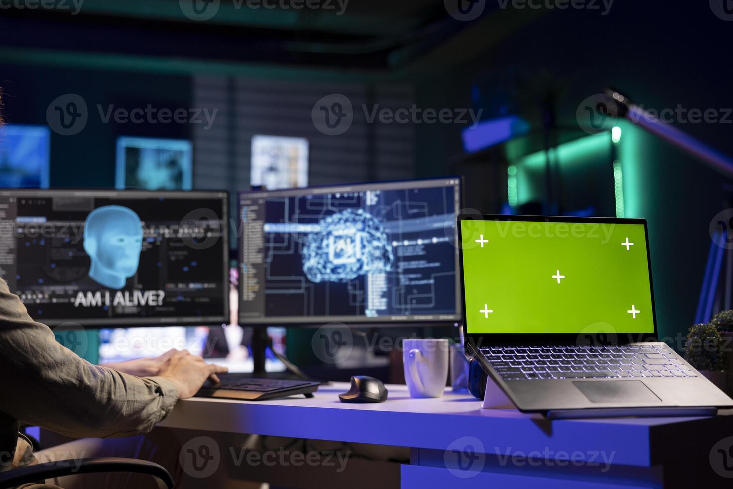 Green screen laptop next to man talking with AI becoming sentient and asking questions. Mockup notebook and developer chatting with artificial intelligence wishing to befriend humanity photo