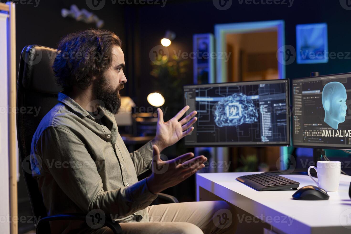 Programmer having shocked expression on face after being asked existential questions by awaken AI on PC. Confused IT specialist bewildered by artificial intelligence able to speak on its own photo