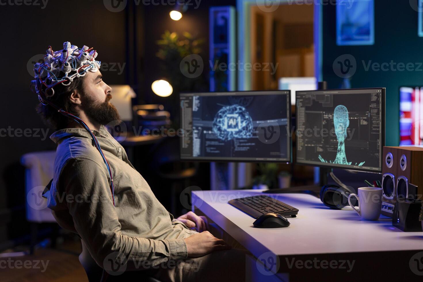 Computer engineer wearing EEG headset on head to communicate with artificial intelligence entity with anthropomorphic body. IT specialist using high tech gear to chat with AI robot in humanoid form photo
