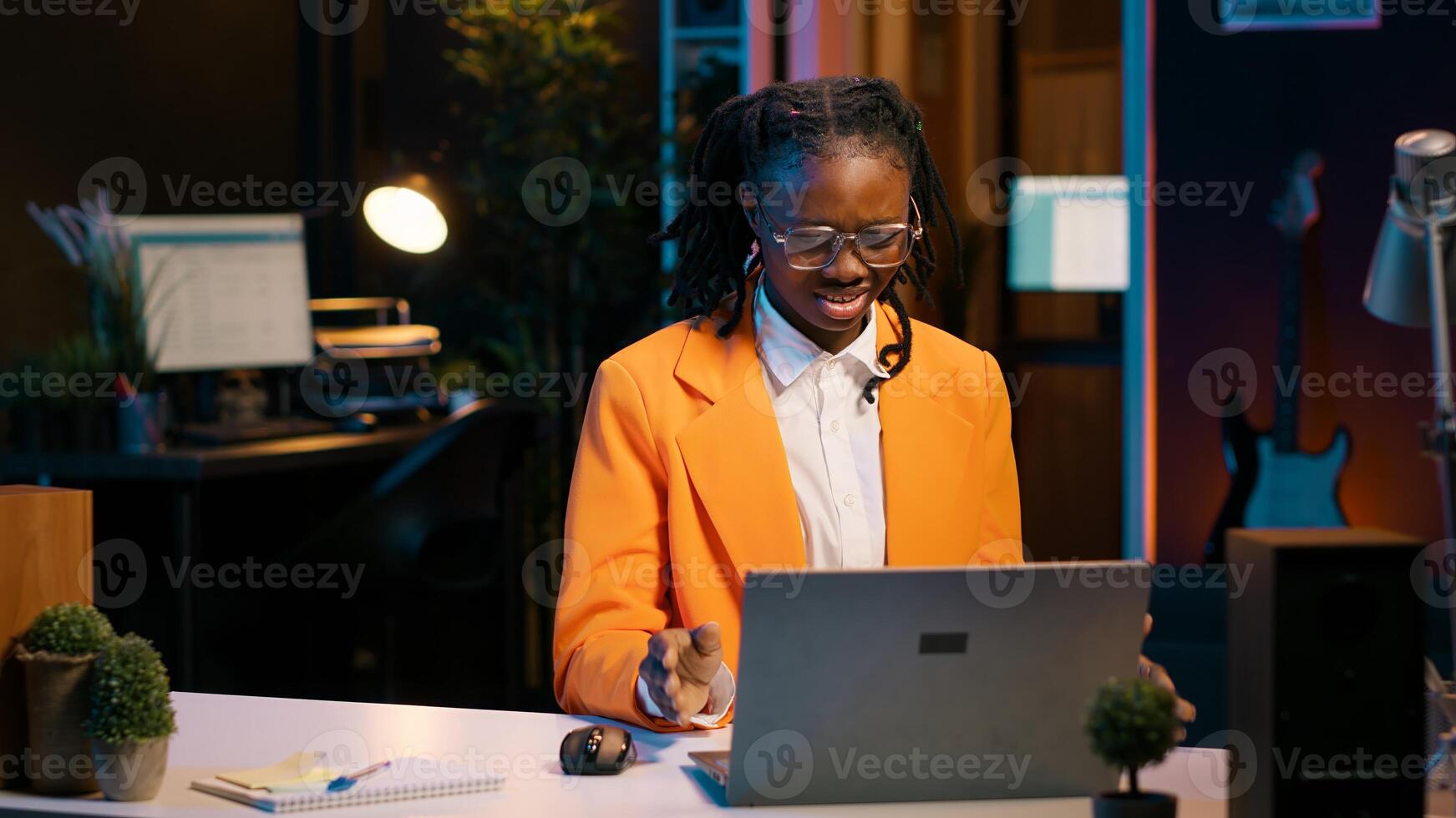 College student having an argument with a classmate while they work on group project, girl hanging up the phone call. Upset annoyed person being frustrated at her colleague. Camera A. photo