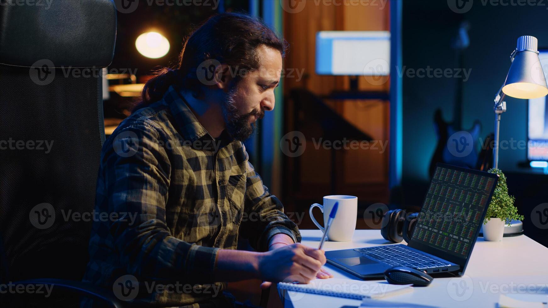 Annoyed broker investor in home office bothered by low stock exchange valuation, screaming after losing money. Angry man yelling and doing facepalm after seeing market shares plummeting, camera A photo