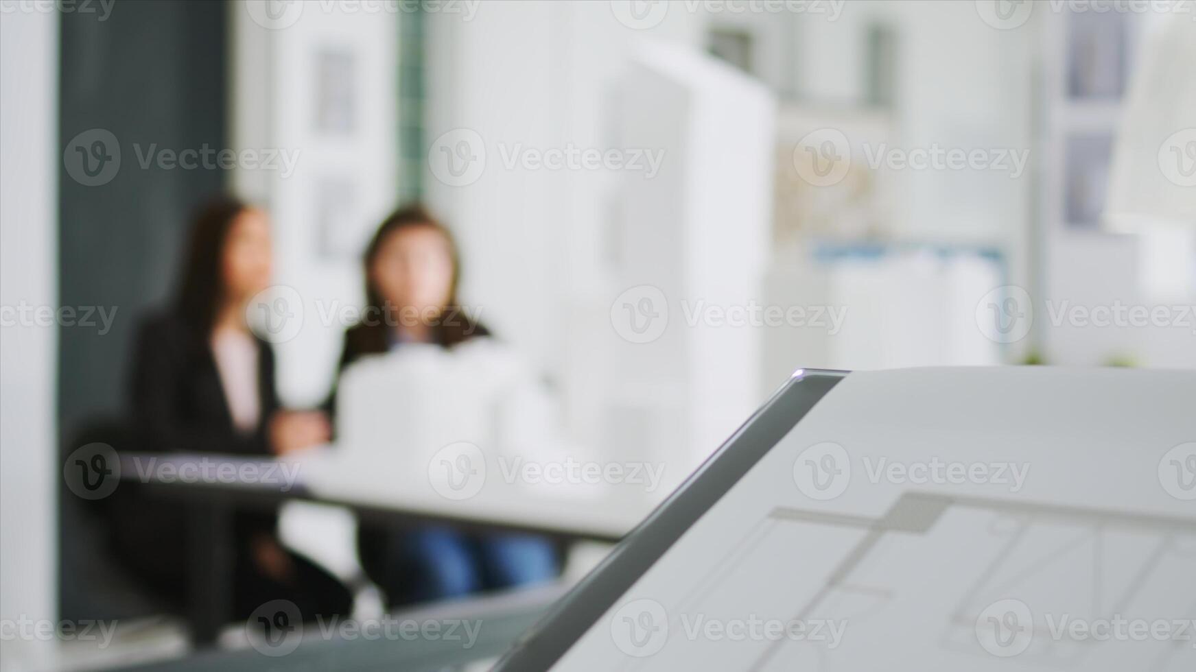 Specialists at creative agency gather data on plans and determine real scale dimensions to guarantee that the building crew gets correct items. Architects researching 3D printed structures. photo