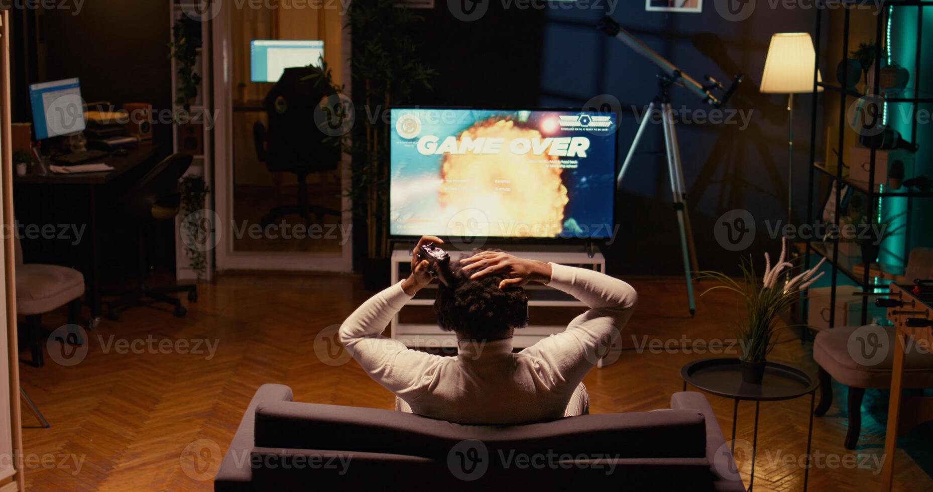 Gamer receiving game over screen, getting his spaceship destroyed in huge explosion while fliying in galaxy and fighting enemies. Player losing science fiction spacecraft singleplayer videogame photo