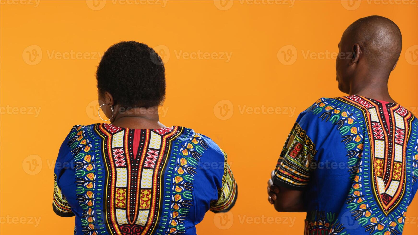 Back view of african american people stopping each other from talking, being frustrated and angry. Man and woman getting tired of listening to complaints from partner, interrupting argument. photo